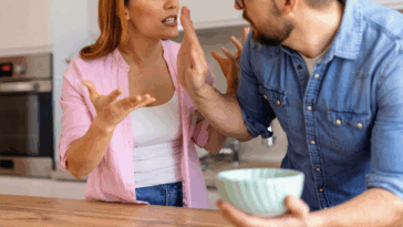couple arguing in kitchen