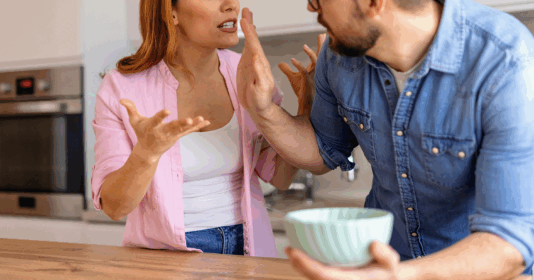 couple arguing in kitchen