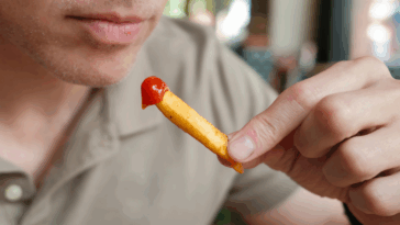 Man eating french fries