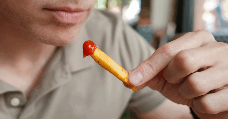 Man eating french fries