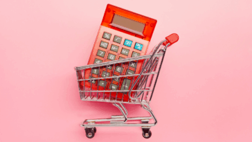 A calculator in a grocery cart.