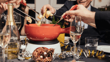 people eating fondue during the holidays