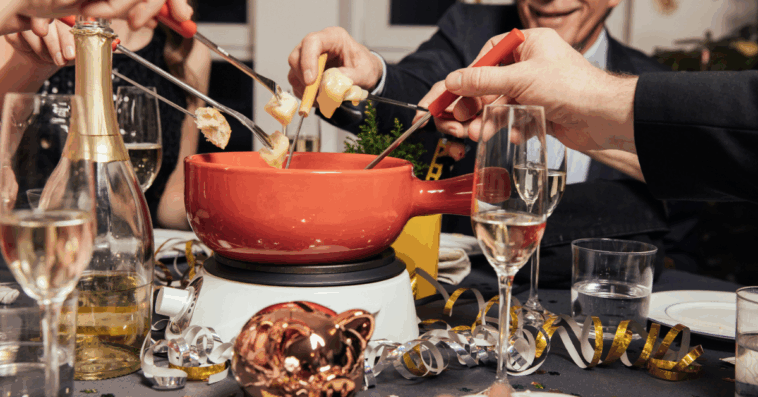 people eating fondue during the holidays
