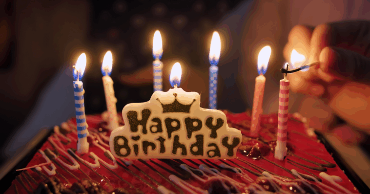 birthday cake candles being lit