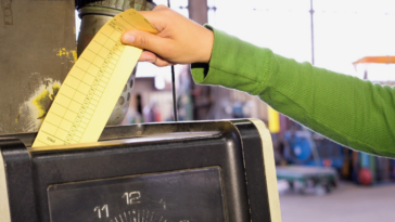 person using timeclock