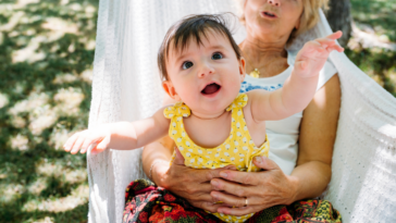 grandmother and granddaughter in hammock