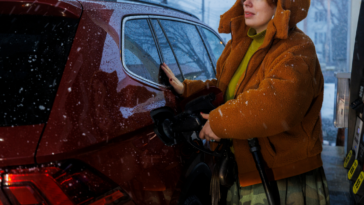 woman pumping gas