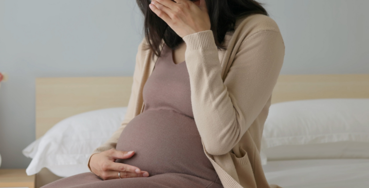 Upset pregnant woman