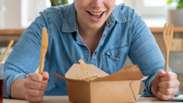 Woman with a takeout food box