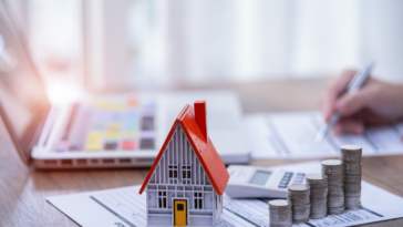 person filling out loan paperwork