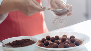 woman making homemade chocolate truffles