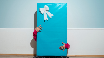 Person holding a very oversized gift