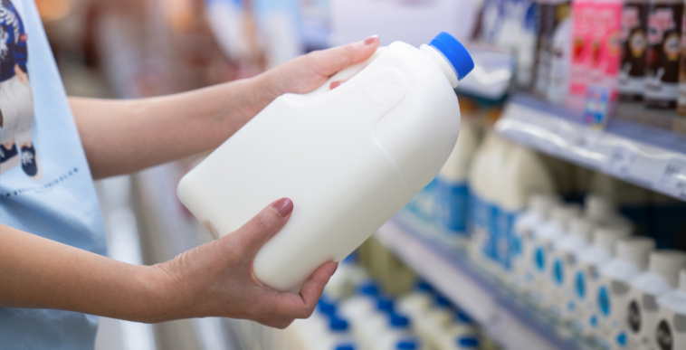 shopping milk aisle at grocery store